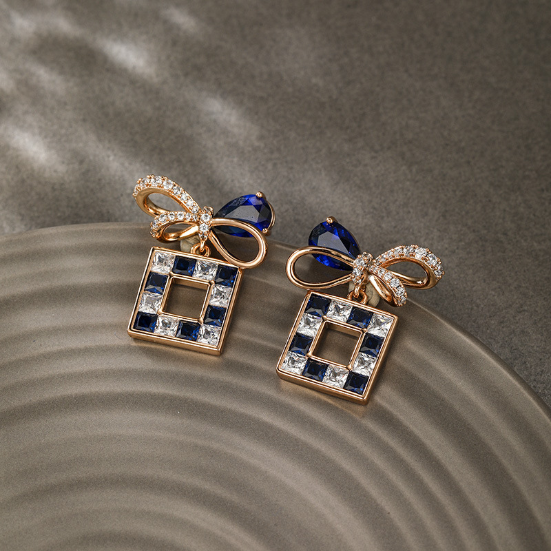 Xuping caibao serie arco caja de regalo pendientes dulce fresco francés retro elegante luz lujo nicho diseño alto sentido