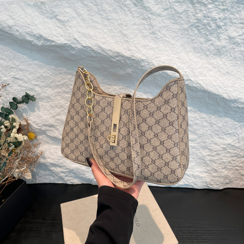 Bolsos de impresión simple debajo de la axila para mujeres 2025 nueva personalidad bolsas de bolsas de bolsas de moda bolsas de hombro casuales