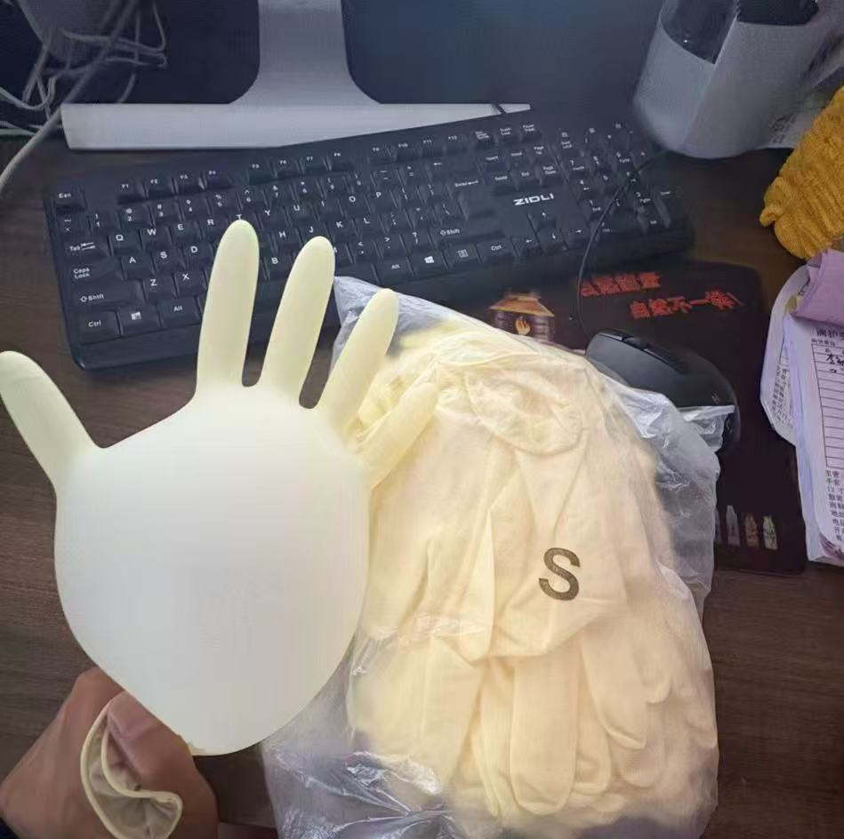 Disposable rubber non-slip wear-resistant elastic gloves