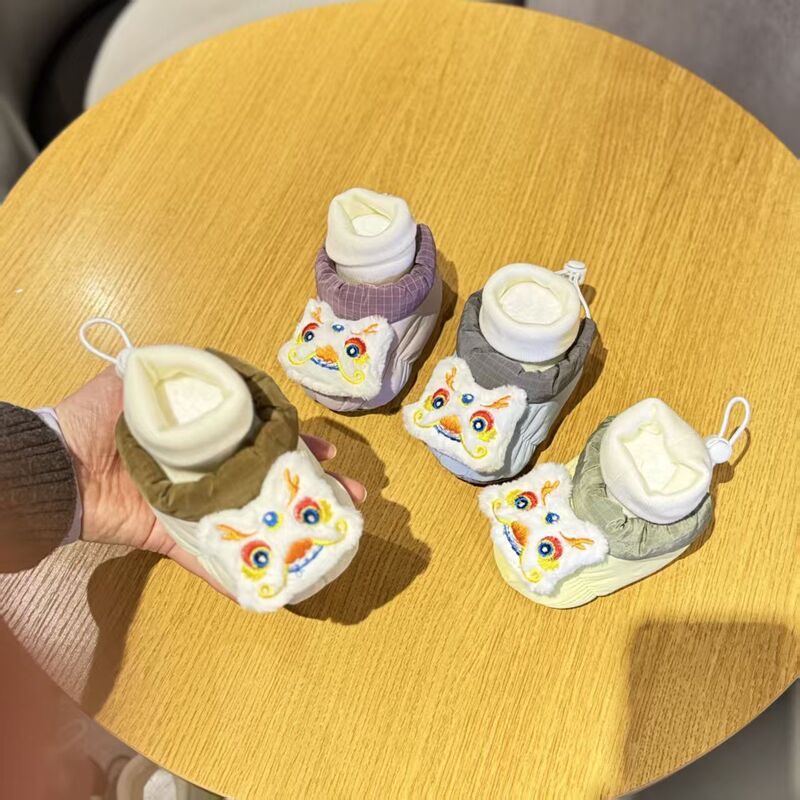 Baby Winter Shoes, New Chinese New Year Shoes, Baby Shoes and Socks, All-In-One Baby Outing Shoes and Socks, Plus Velvet Anti-Slip Socks Baby Winter Shoes, New Chinese New Year Shoes, Baby Shoes and Socks, All-In-One Baby Outing Shoes and Socks, Plus Velvet Anti-Slip Socks