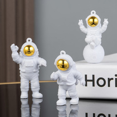 かわいい宇宙飛行士のテーブルの小さい置物のミニの小さい人形の創意の現代はケーキを飾って宇宙飛行士を飾ります。