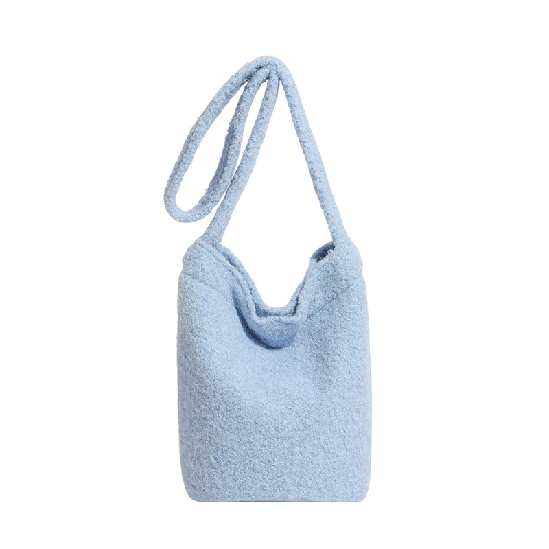 Bolsa de moda coreana de lana 2025 nuevo bolso de cubo de peluche suave glutinoso estilo extranjero de moda bolso de hombro de una sola mujer