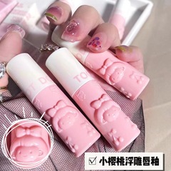 Toot dodo ~ 女の子のさくらんぼの鏡面の唇の釉薬の浮き彫りは澄んでいます。