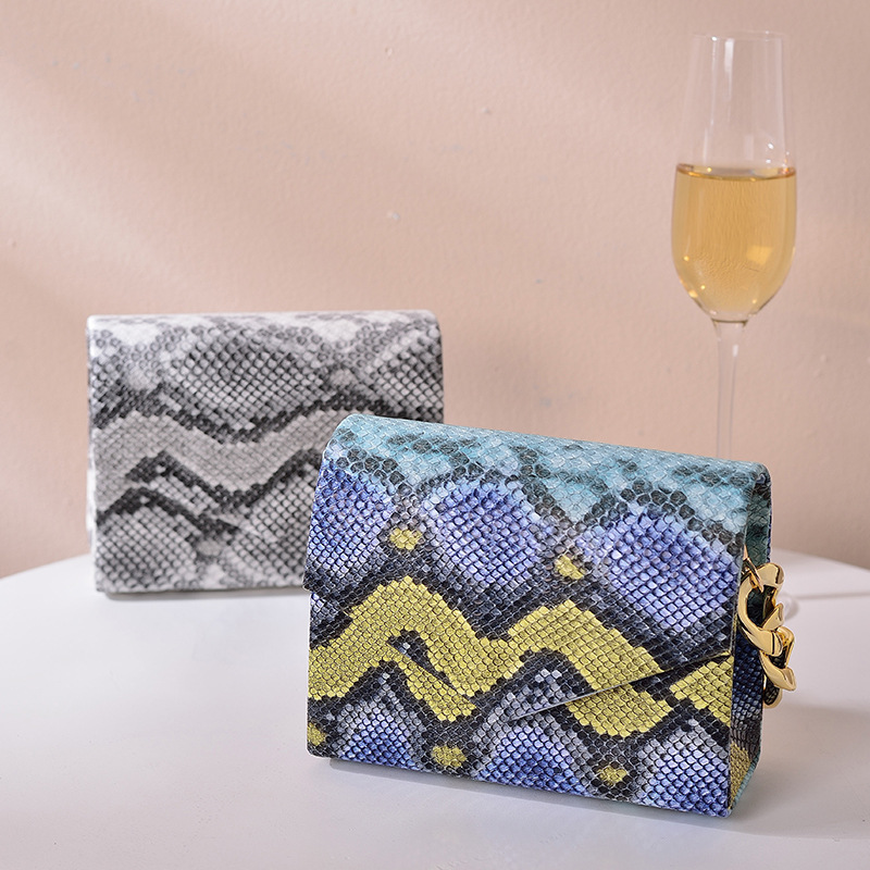 Creativa nicho de moda serpentina bolsa de estilo europeo y americano cadena patrón animal bolsa cruzada-frontera bolso de noche de las mujeres