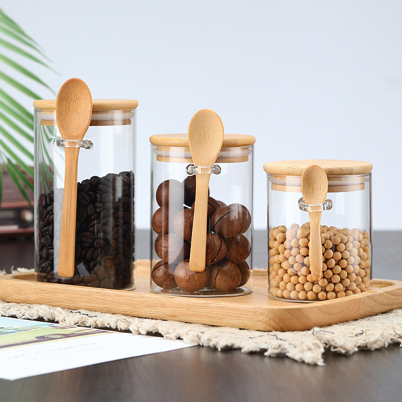 vidrio redondo resistente a altas temperaturas de alta borosilicona con cuchara tanque de sellado condimento transparente tanque de almacenamiento de granos de cocina frutas secas