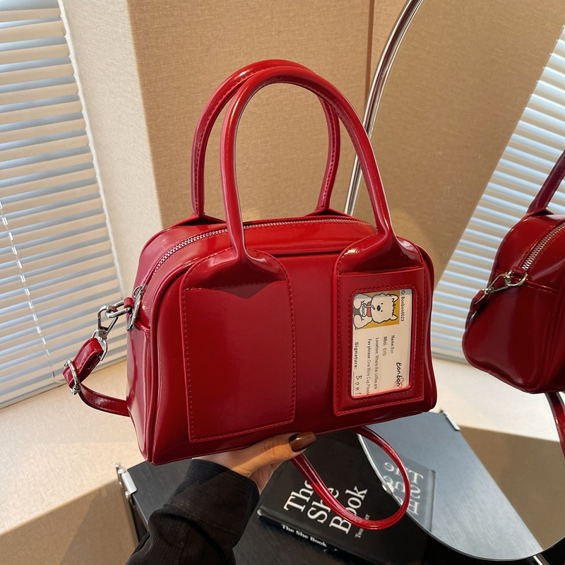 Bolso cuadrado pequeño portátil de niña linda en la mano 2025 nuevo bolso de mensajero de un solo hombro de moda coreana bolso femenino de alta gama