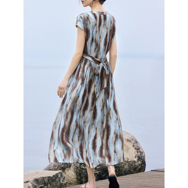 The new flowing and elegant smudge printed V-neck dress for Xiaowu…
