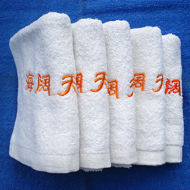 Bathing white towel 21 three-needle five-thread lock edge 34*78 sea broad sky embroidery gold characters good water absorption Bathing white towel 21 three-needle five-thread lock edge 34*78 sea broad sky embroidery gold characters good water absorption
