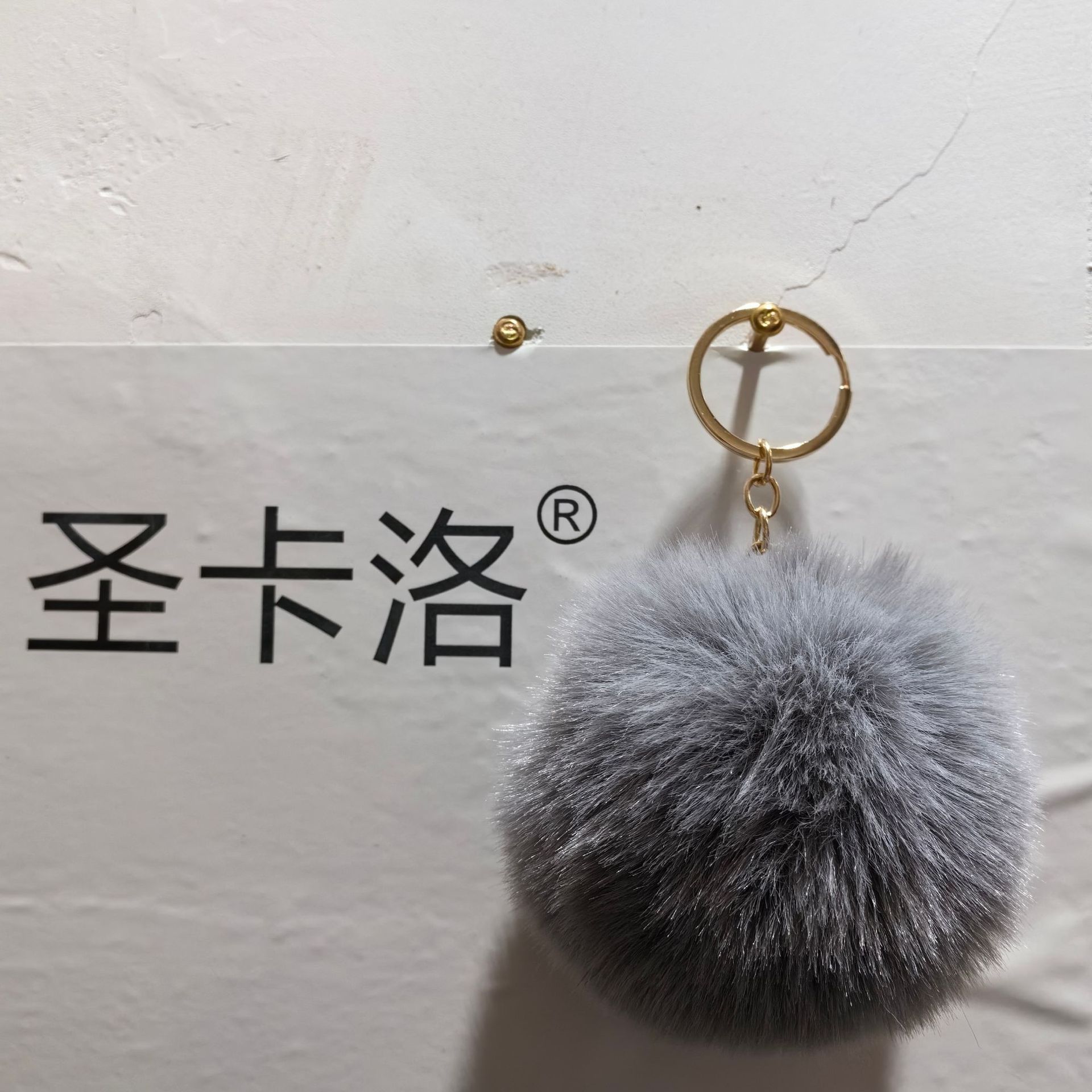 Elemento verde colgante cuerda llavero de peluche de piel artificial bolsa de lana corta colgante damas colgando bolsa accesorios al por mayor