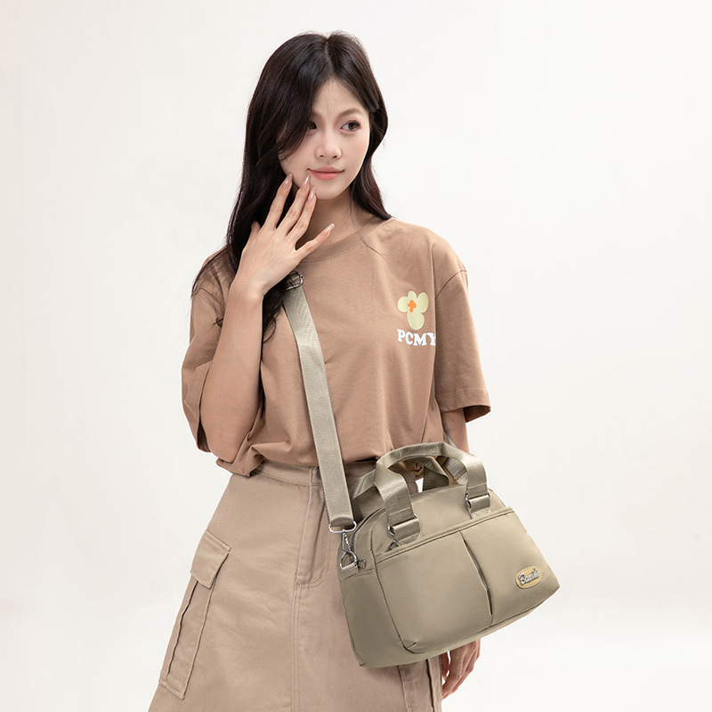 Trend transfronterizo 2025 nuevo bolso de mujer de gran capacidad bolso de nailon ligero bolso de mensajero de hombro salvaje de estilo occidental