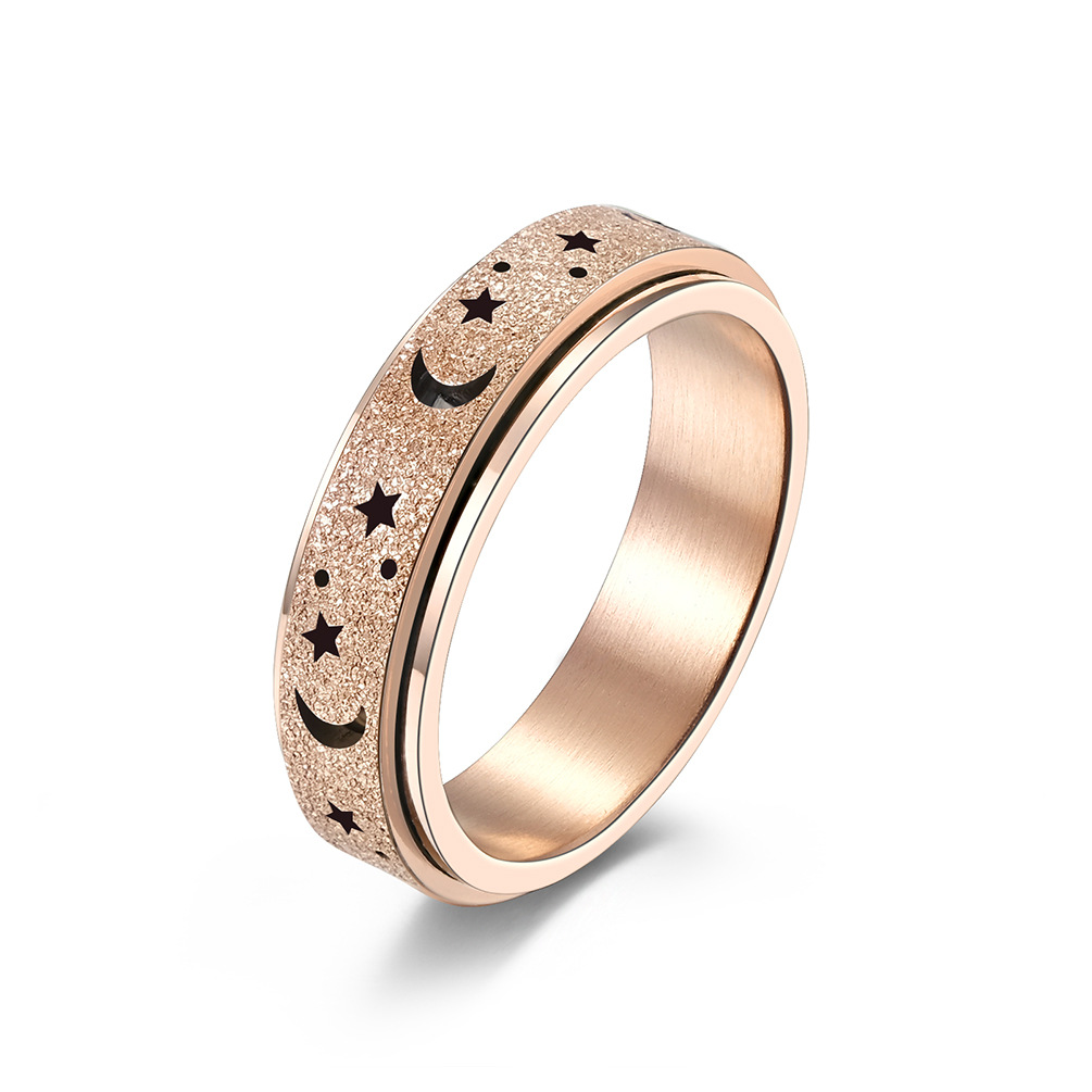 Amazon Frosted Hollow estrella Luna Acero inoxidable anillo giratorio alivio estrés titanio acero anillo de las mujeres pulsera