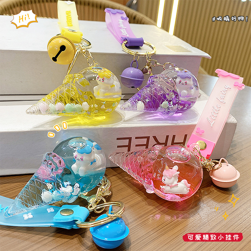 Llavero de unicornio transfronterizo para mujer, exquisito y lindo colgante de botella de arena líquida de cristal con forma de helado, accesorio para mochila, pequeño adorno.