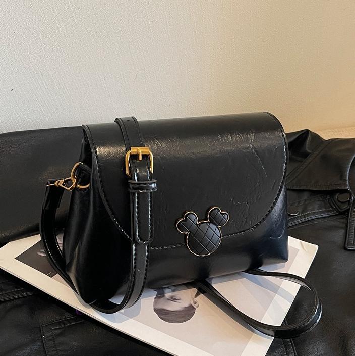 Este año, la popularidad de bolsos retrógrados para mujeres 2024 otoño y invierno nuevo bolso cuadrado de textura superior, bolso de mochila simple