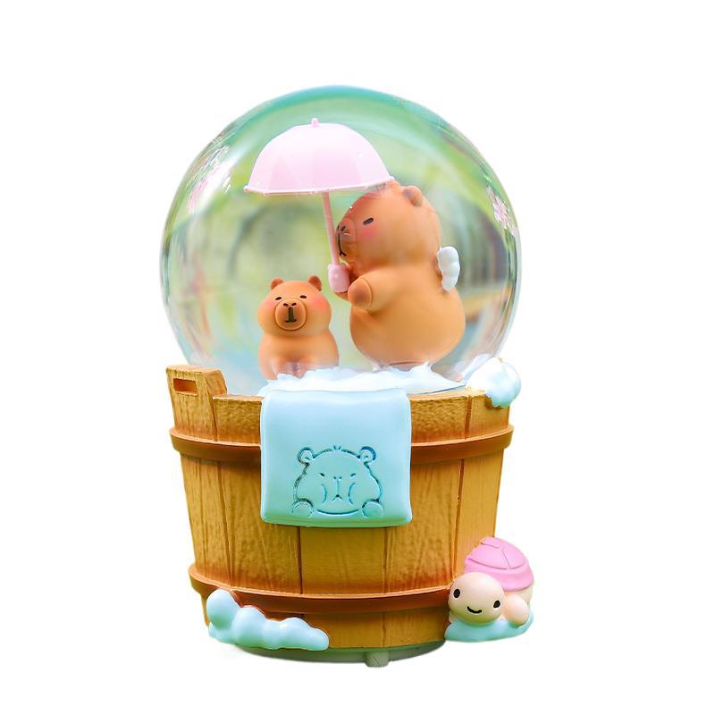 Caja de música de bola de cristal de Kapibala ingenua y linda, adornos de escritorio luminosos, nieve que cae, regalo de cumpleaños para estudiantes y niños