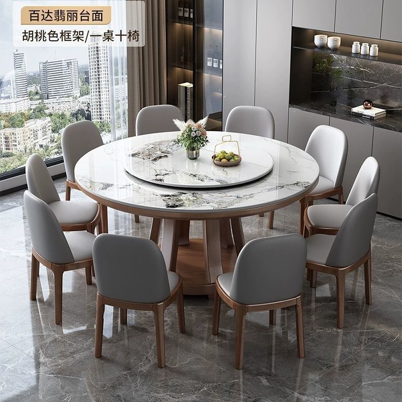 Mesa de comedor de tabla de roca de lujo ligera, mesa redonda de madera maciza doméstica con mesa giratoria, mesa de comedor redonda de alta gama con horno electromagnético rojo.