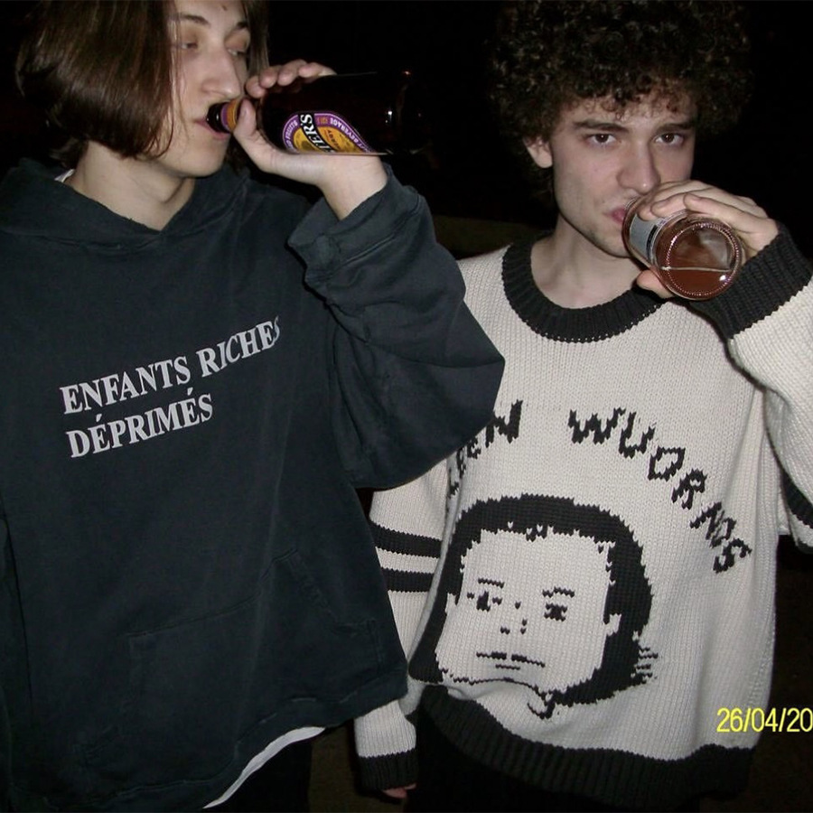 ERD melancólico rico de dibujos animados de segunda generación, suéter de color, suéter de punto relajado de cuello redondo, hombre y mujer.