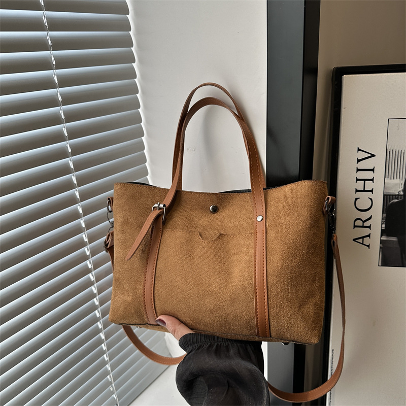 Nueva textura retro bolso de mujer extranjero empalme esmerilado simple mochila de hombro de gran capacidad de transporte