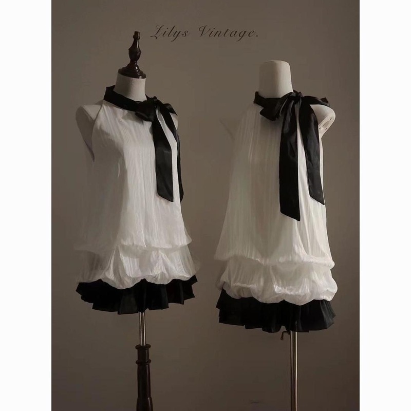 女性用の高級感のある娘風のおしゃれな洋服、甘いホルターネックのつぼみドレス、蝶結びのスプライシングショートスカート|undefined