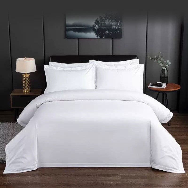 Tejido poliéster completo de cuatro piezas proceso de molienda de carbono resistente al lavado resistente al desgaste fábrica de ropa de cama de hotel al por mayor tela de hotel