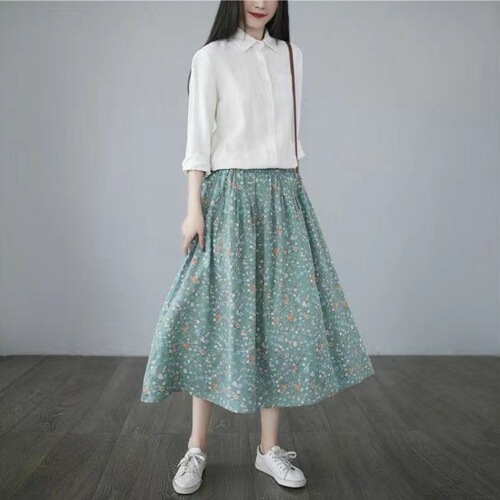 Pocket artistic small floral skirt women's mid-long fresh summer new slimming high-waist a-line skirt