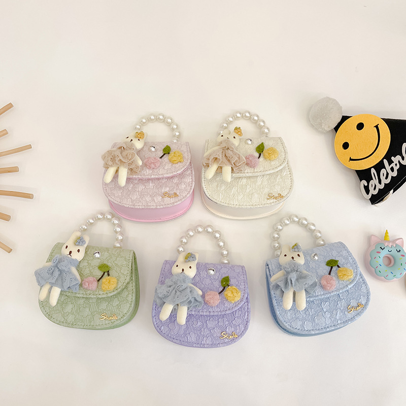 Bolso de los niños otoño e invierno nuevo lindo conejo perla bolso de mano chica princesa encaje bolsa de mensajero monedero comercio exterior