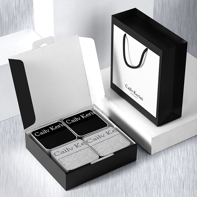 4 square boxes [black + black + light gray + light gray]