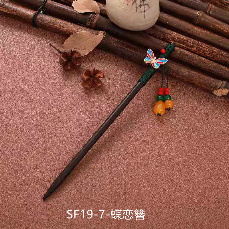 黒檀の木のかんざしのフリンジをまねて、かんざしの子供の古風な頭飾りをします。|undefined