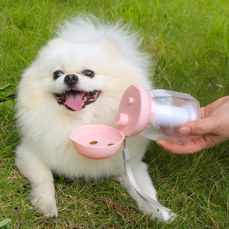 Taza de agua para mascotas al aire libre portátil dos en uno bolsa de basura alimentación de agua multifuncional taza de agua para mascotas
