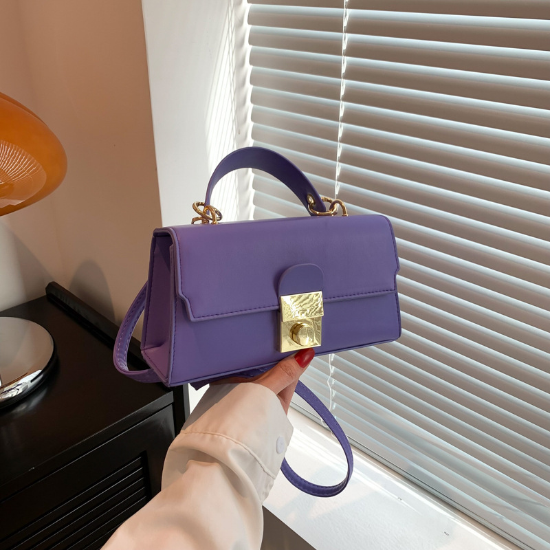 2025 primavera nuevo temperamento diseño de moda estilo extranjero textura simple mochila de hombro bolso de bloqueo de mano color caramelo