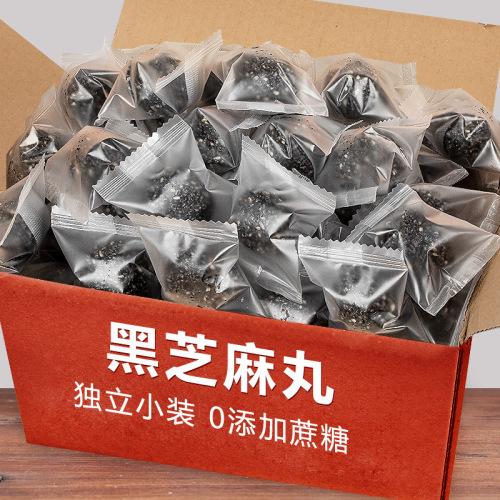 Black sesame balls, honey sesame balls, balls, black and shiny handmade traditional pastries, ready-to-eat snacks for pregnant women