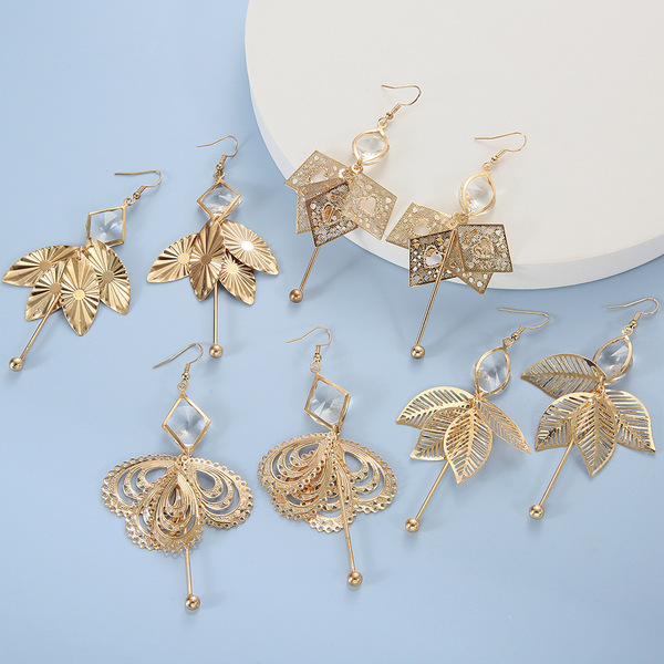 fashionable golden geometric earrings with tassels