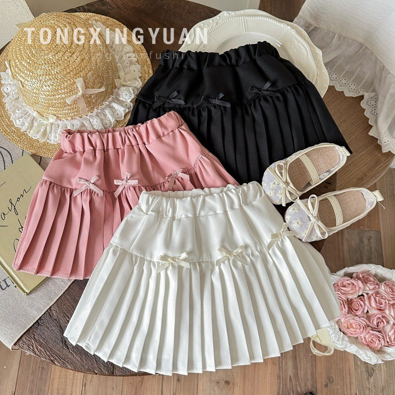 Falda corta de verano redonda de estrella infantil, falda de media longitud drapeada para niños, falda plisada con lazo tridimensional dulce para niñas, marea