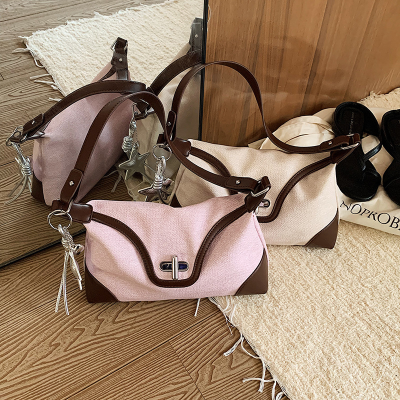 Bolso de moda de color contraste para mujeres 2026 nuevo estilo de viaje diario sensación de bolso de brazo de hombro universal para salir bolso pequeño