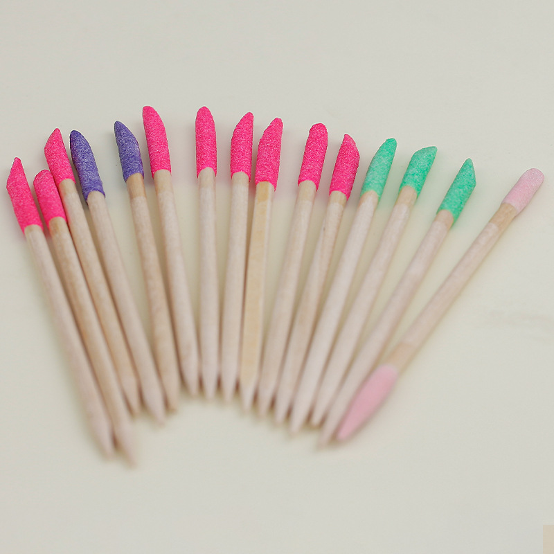 Herramientas de manicura al por mayor palo de madera de naranja palo de madera empuja la piel muerta 100 palos de madera de naranja de doble punta en bolsas