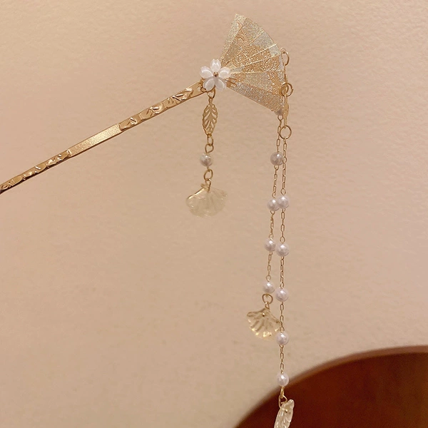 Golden carved Chinese hairpin