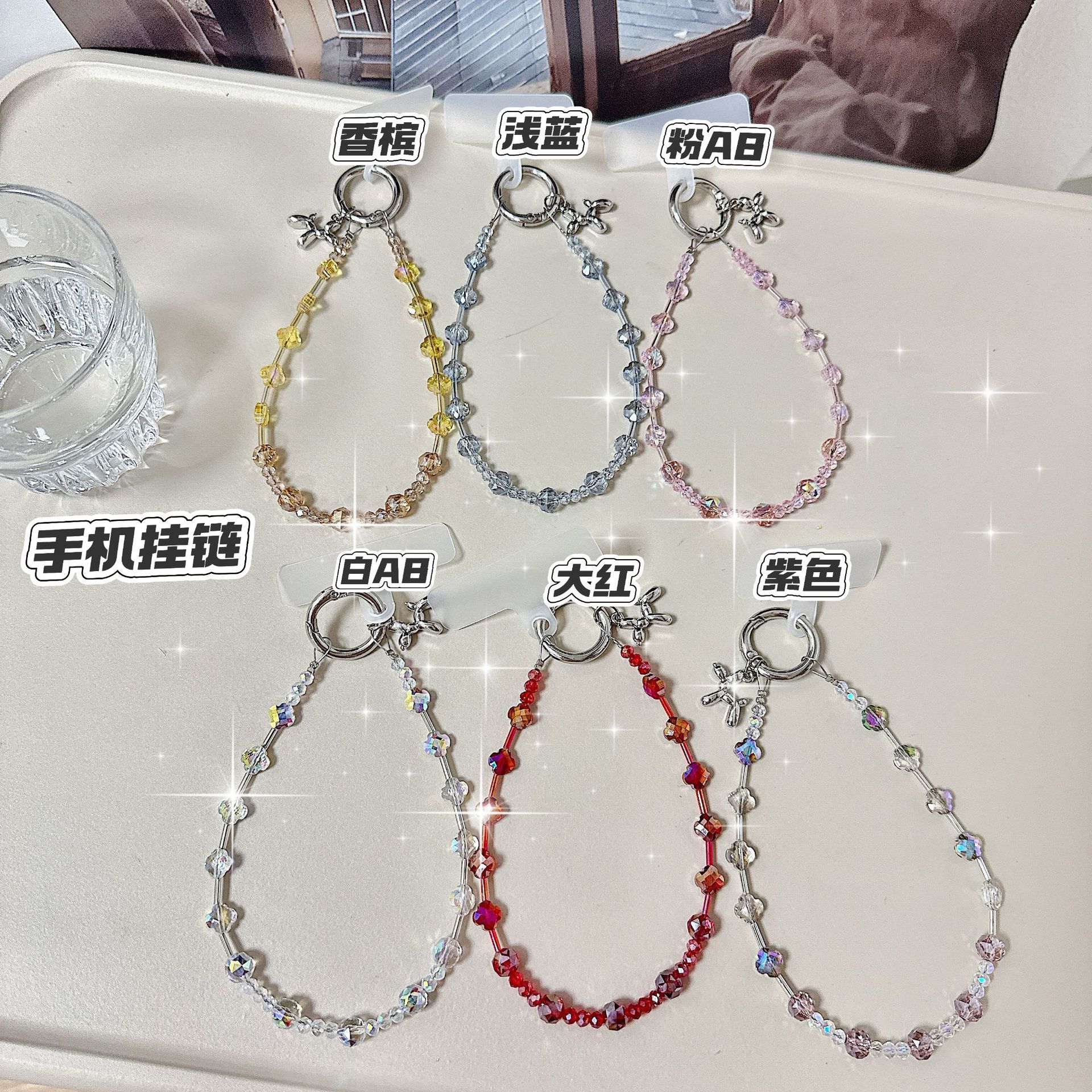 Boutique hecho a mano de alta gama para teléfono móvil cadena de muñeca de trébol de cuatro hojas de cristal original cadena de teléfono móvil de moda cuerda corta