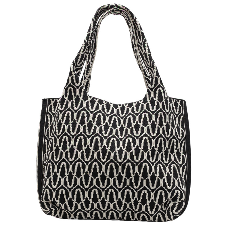 Knitted bags are fashionable and versatile. Knitted tote handbags are new large-capacity shopping bags for women. Single-shoulder bags are new for office workers undefined