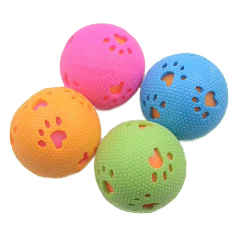 Transfronterizo nuevo juguete para mascotas huellas huecas bola de sonido resistente a los mordiscos TPR perro juguete de goma bola elástica