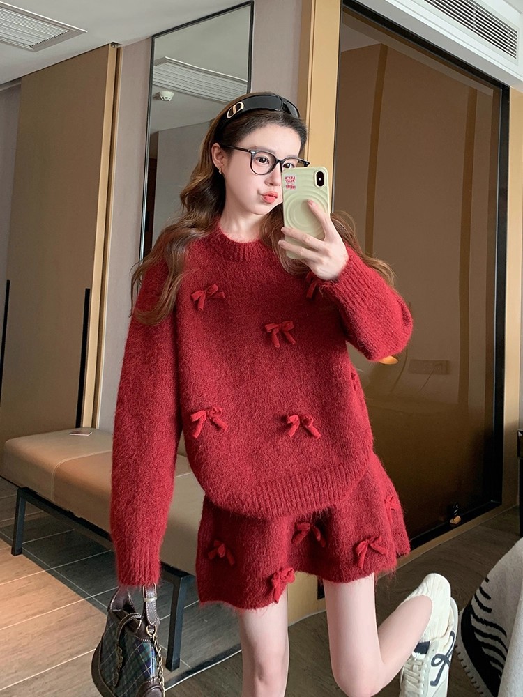 Red sweater with bow