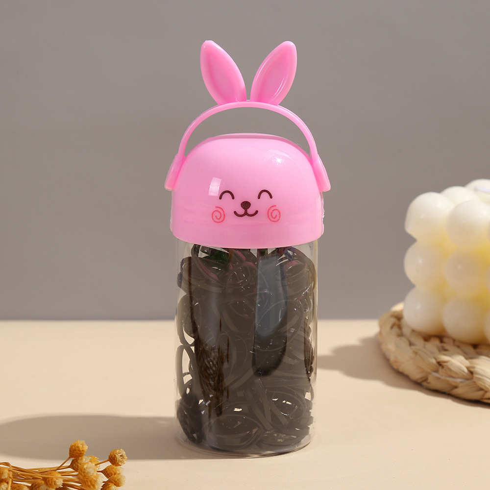 Conejo de dibujos animados color negro barril elástico desechable bebé rendimiento de cabello anillo de cabello tocado tienda binaria