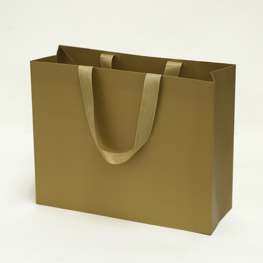 Bolsa de cartón blanco logotipo tienda de ropa bolsa de mano bolsa de regalo espesa bolsa de regalo de Navidad se puede imprimir