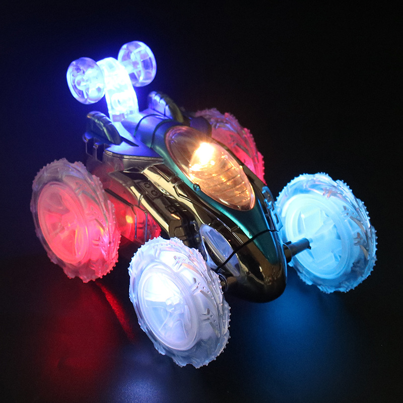 Efectos especiales eléctricos para niños 2,4g camión volquete de control remoto de cuatro vías con control remoto ligero puesto de camión volquete de coche al por mayor