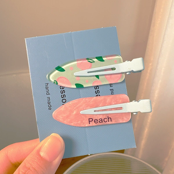 2 peaches [excluding cardboard]