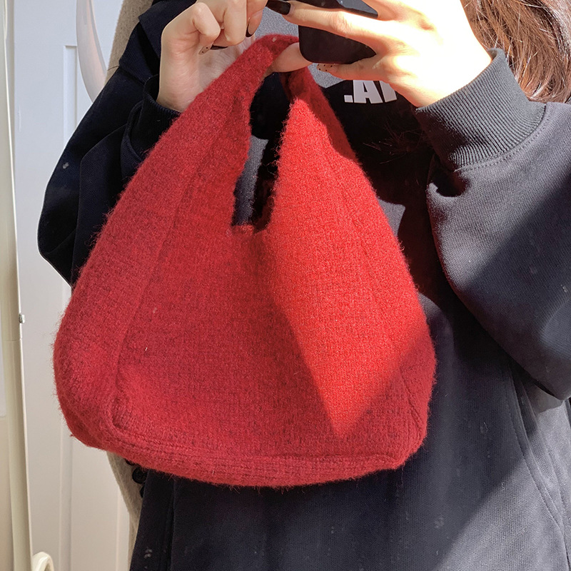 Nuevo otoño y invierno con bolso de lana, bolso de lana de mujer, estilo coreano de alta calidad, simple y versátil bolso de viaje de color sólido.