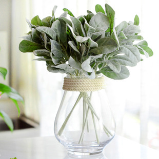 Green leaves green plant decoration hair planting rabbit ear leaf plant wall flower wall background silk flower wedding fake flower