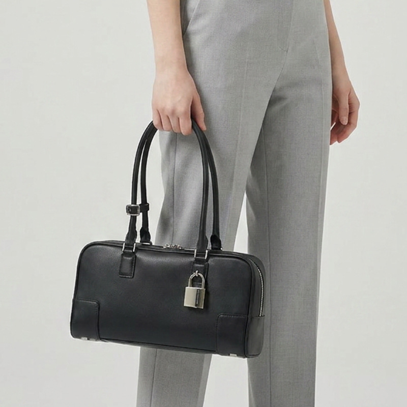 Luxe designertas Niche Luojia Rundleer Onderarmtas voor Dames Europese en Amerikaanse Vintage Bowling Handtas Boston Tas Grote Capaciteit Authentiek_voghion.com