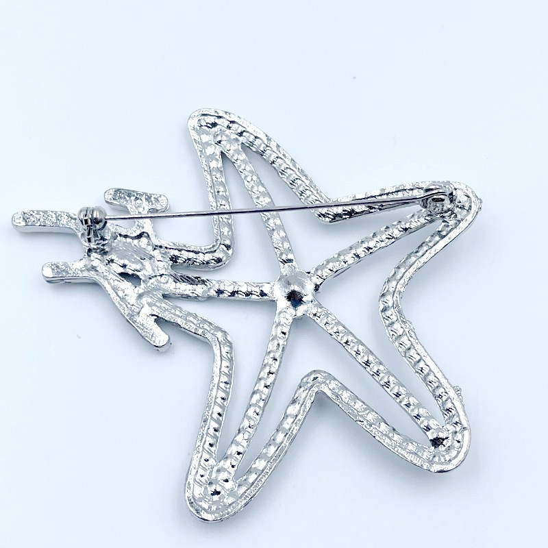 Venta caliente europea y coreana pin luz lujo moda viajero versátil estrella de cinco puntas broche Inglés estilo Chanel ramillete personalizado Accesorios