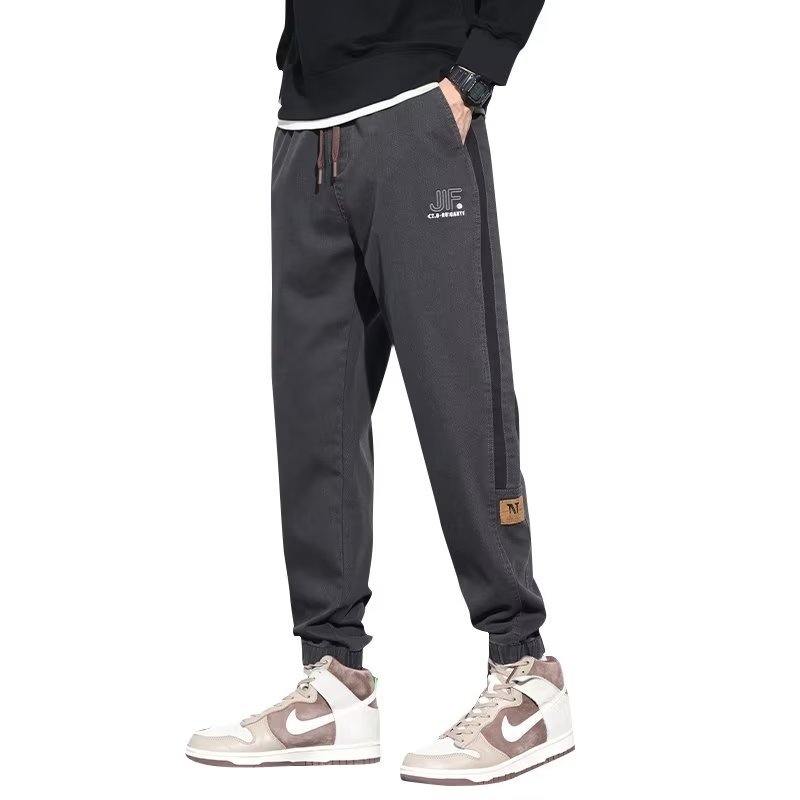 Pantalones casuales, marca de moda de otoño e invierno para hombres, pantalones bonitos, pantalones largos de Harlan de mezclilla de nuevo estilo, marea de gran tamaño para hombres