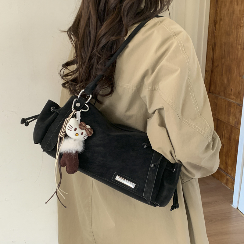 Coreano Maillard nicho bolsas de perros calientes retro mate bolsas de hombro para mujeres 2025 nueva bolsa de viaje