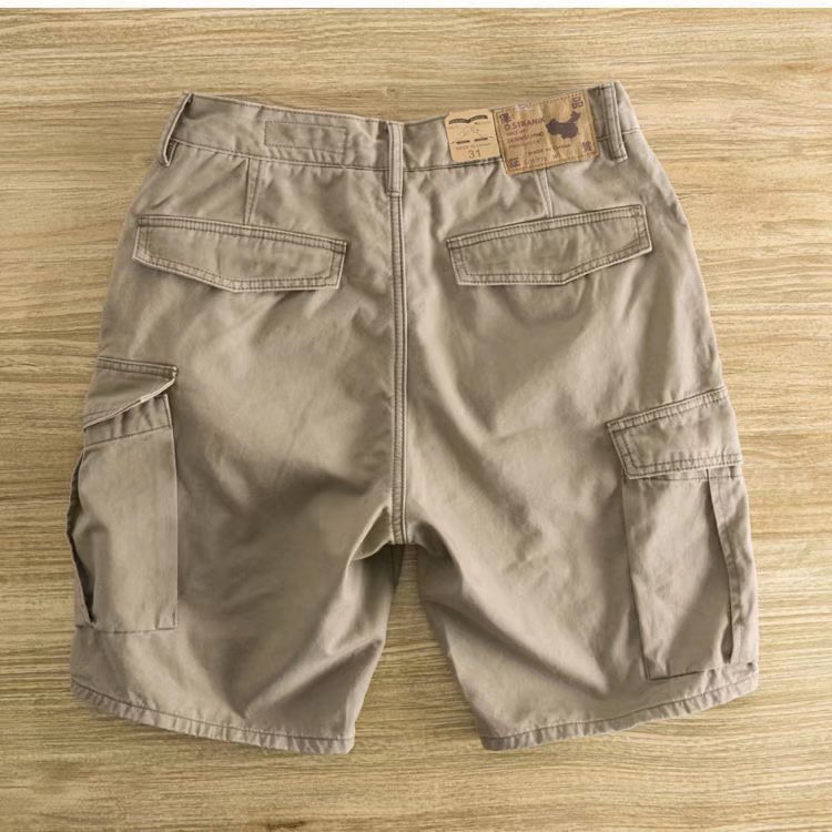 Ropa de trabajo de verano Pantalones cortos casuales americanos Pantalones rectos de ajuste de los hombres Pantalones cortos multibolsillos de color transpirable de moda